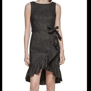 Beautiful  new dress Calvin klein gold and black color